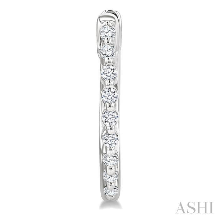 1/6 Ctw Petite Shared Prong Round Cut Diamond Hoop Earrings in Sterling Silver