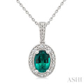 7X5 MM Oval Shape Lab-Created Emerald and 1/50 Ctw Round Cut Diamond Precious Pendant With Chain in Sterling Silver